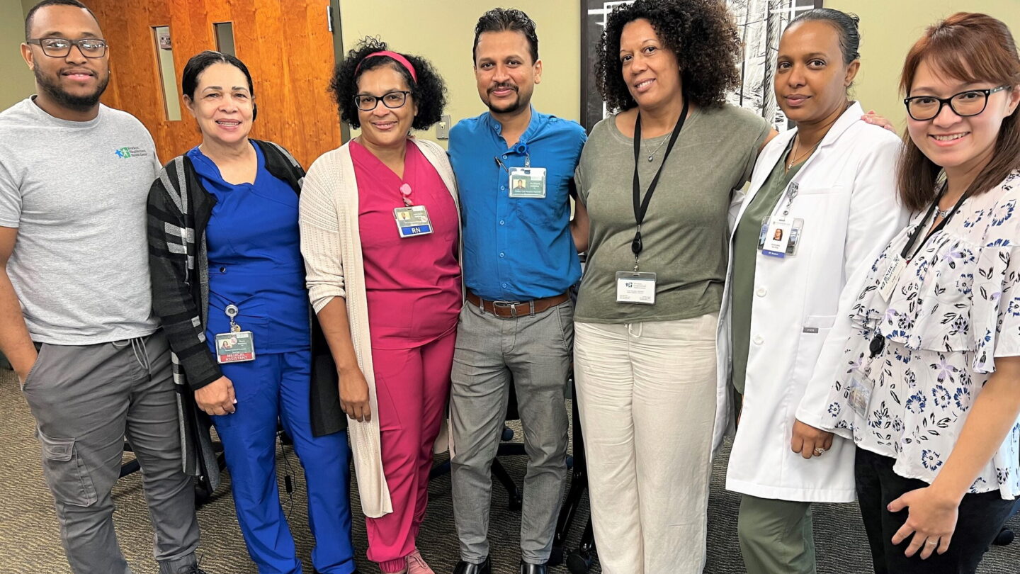 Team members from "The ER Can Wait" hospital readmission group.